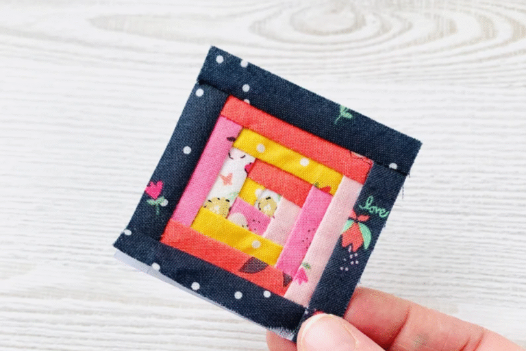 cute log cabin quilt block pattern in various fabric